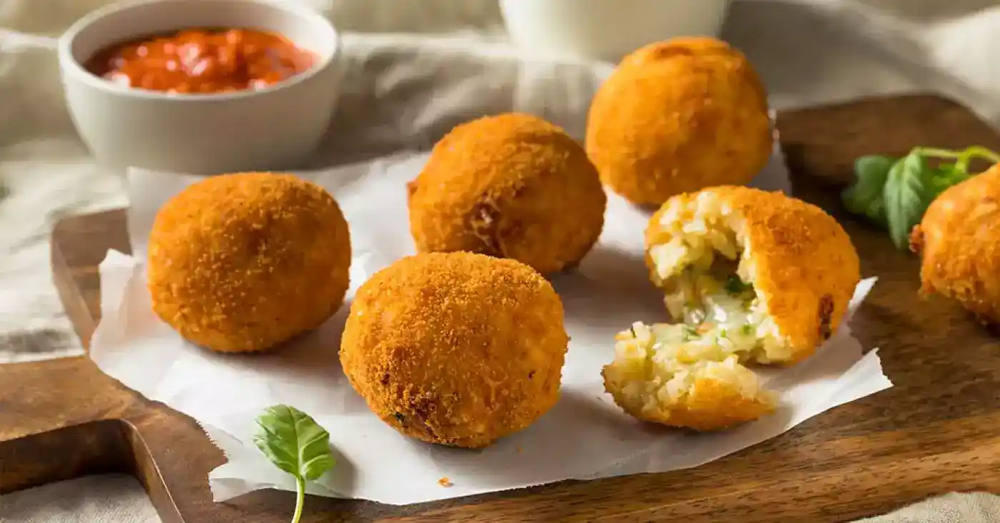 Arancini italianos, bolas de arroz rellenas